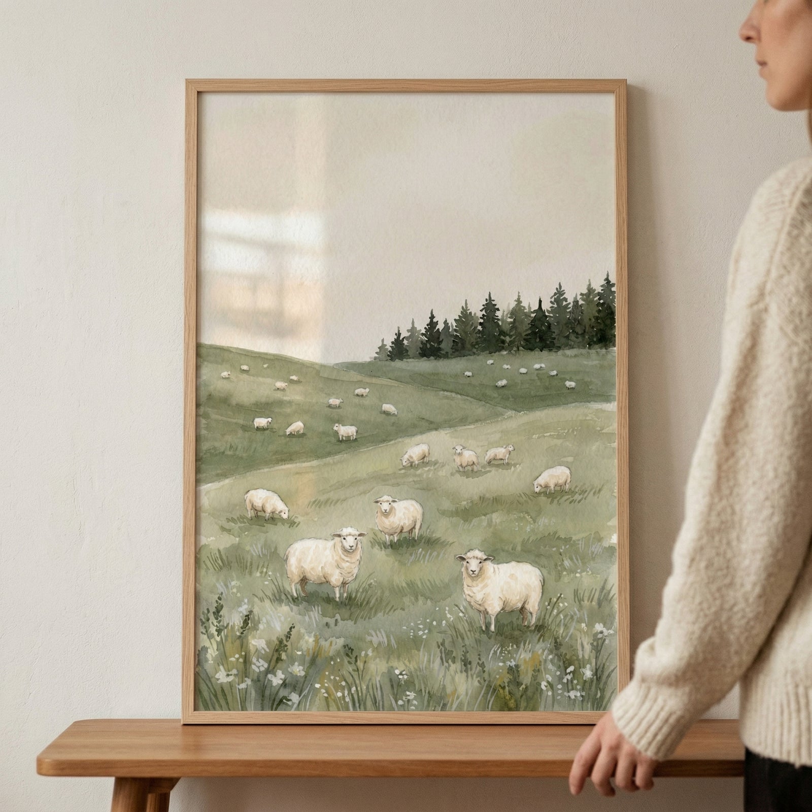 A serene watercolor illustration of a group of fluffy white sheep grazing in a lush, green rolling meadow. Two prominent sheep are in the foreground, one looking towards the viewer with a gentle expression. 