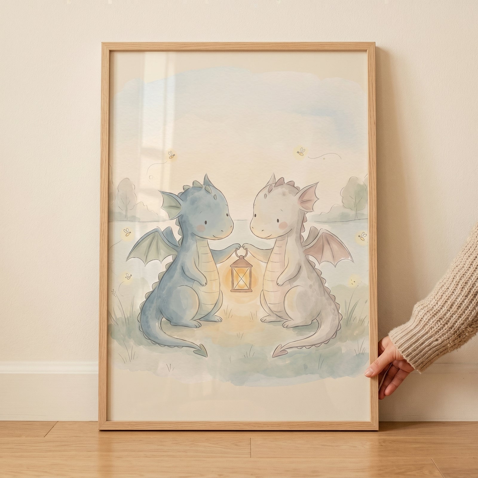 Watercolor lantern holding dragons wall art shows a blue and a white dragon holding a lantern in a soft meadow.