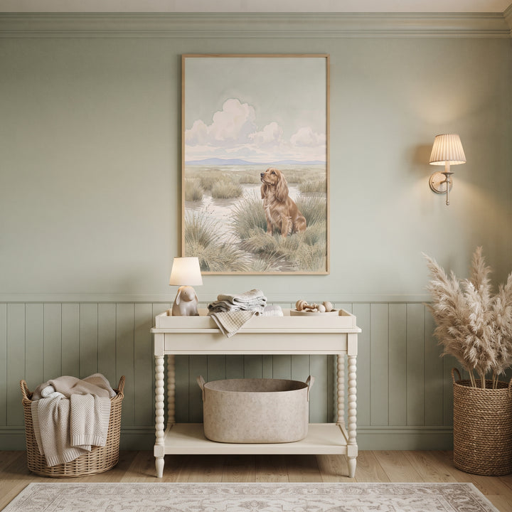 Watercolor marsh cocker spaniel dog wall art above a changing table in a nursery with sage green walls and wainscoting.