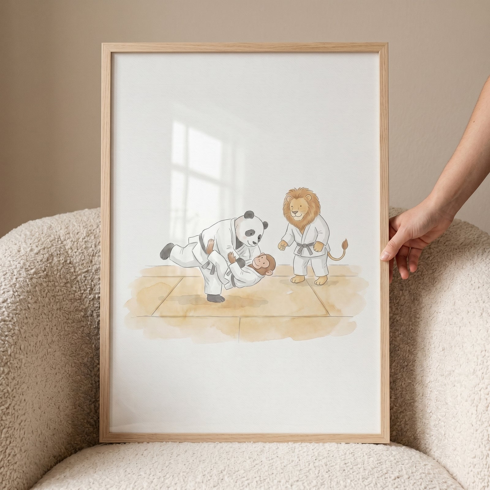 Framed watercolor martial arts animals wall art depicts a panda, monkey, and lion practicing on a mat.