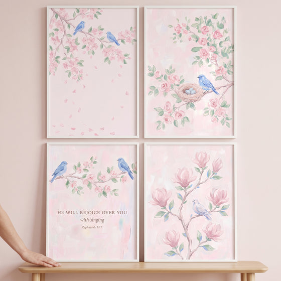 Watercolor pink floral bird wall art set of 4 featuring blue birds, cherry blossoms, a nest, and a scripture verse.