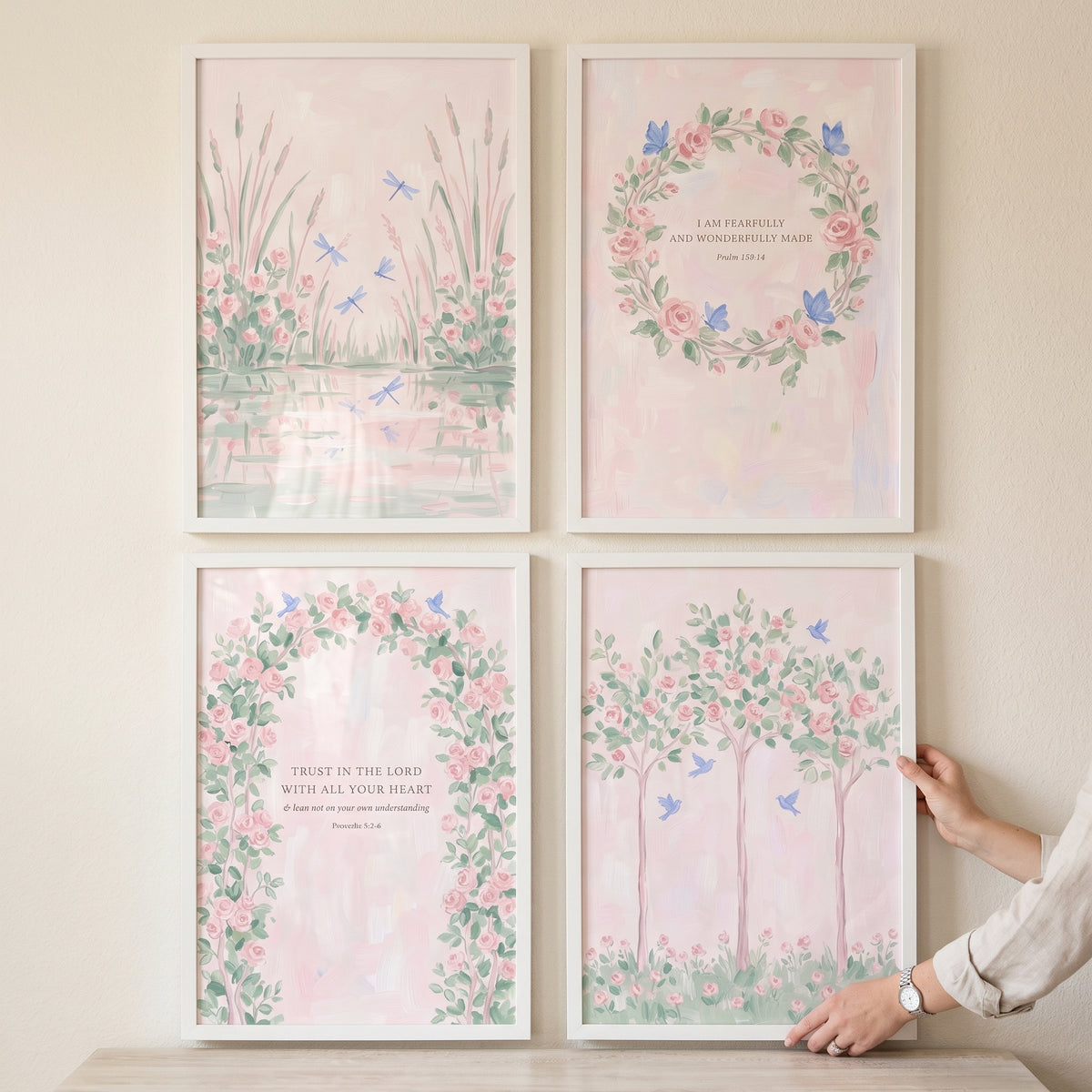 Watercolor pink rose garden wall art set of 4 with floral wreaths, arches, and trees featuring butterflies and scripture.