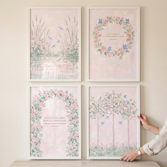 Watercolor pink rose garden wall art set of 4 with floral wreaths, arches, and trees featuring butterflies and scripture.