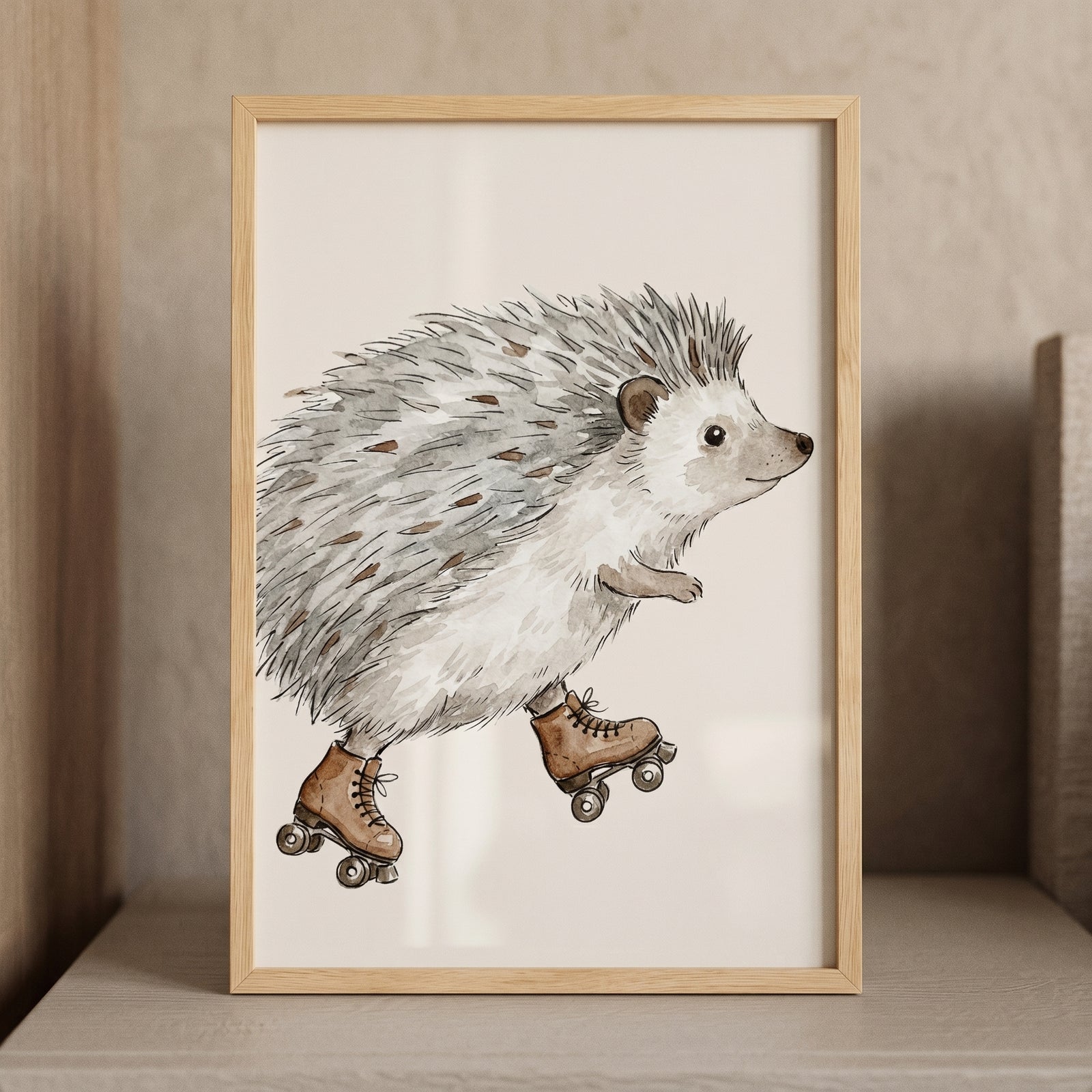 Watercolor roller skating hedgehog wall art in a light wood frame shows a cute animal wearing brown skates.