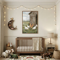 A cozy, farm-themed nursery is designed with a warm, neutral color palette. A string of glowing globe lights hangs in a gentle arc across the top of the wall. Centered below the lights is a large piece of wall art framed in dark wood, depicting a rustic barn and a group of chickens and a rooster in a grassy field. 