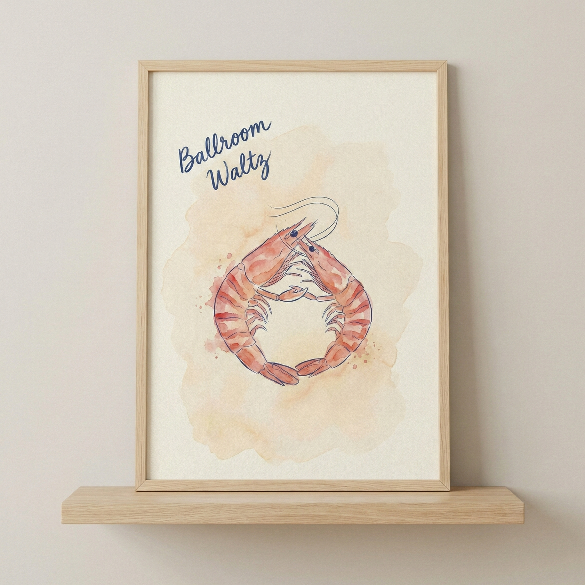 A framed watercolor-style illustration of two shrimp displayed on a wooden shelf. The shrimp are depicted in shades of orange and red, positioned in a circular formation as if they are dancing together. In the top left corner, the words "Ballroom Waltz" are written in a blue script font. The artwork is housed in a light-colored wooden frame, which rests on a matching wooden shelf against a plain, neutral-toned wall.