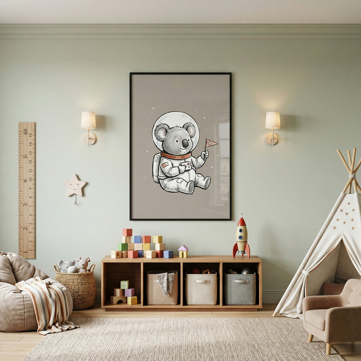 Watercolor space explorer koala wall art in a playroom with a teepee, wooden toy shelf, and a bean bag chair.
