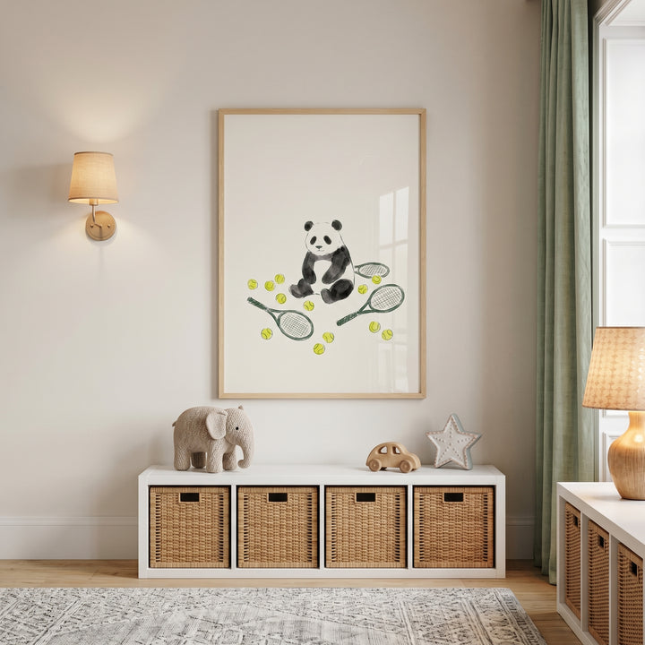 Watercolor tennis ball panda wall art hangs above a storage bench with woven baskets and children's toys.