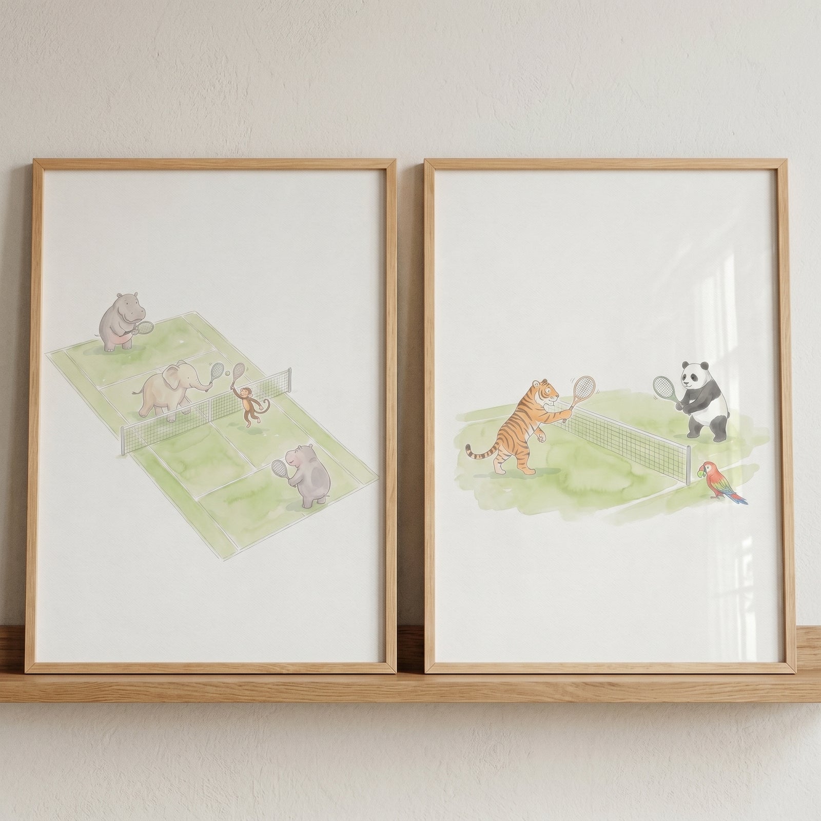 Watercolor tennis safari animals wall art set of 2 showing a tiger, panda, hippo, and elephant playing on green courts.