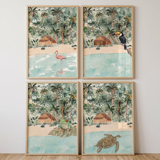 Watercolor tropical jungle animals wall art set of 4 featuring a flamingo, toucan, frog, and turtle on a tropical beach.