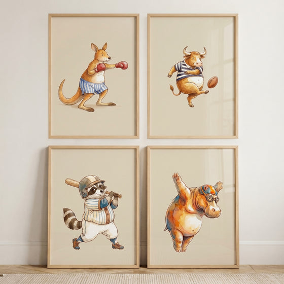 Watercolor whimsical sports animals wall art set of 4: boxing kangaroo, football bull, baseball raccoon, and diving hippo.