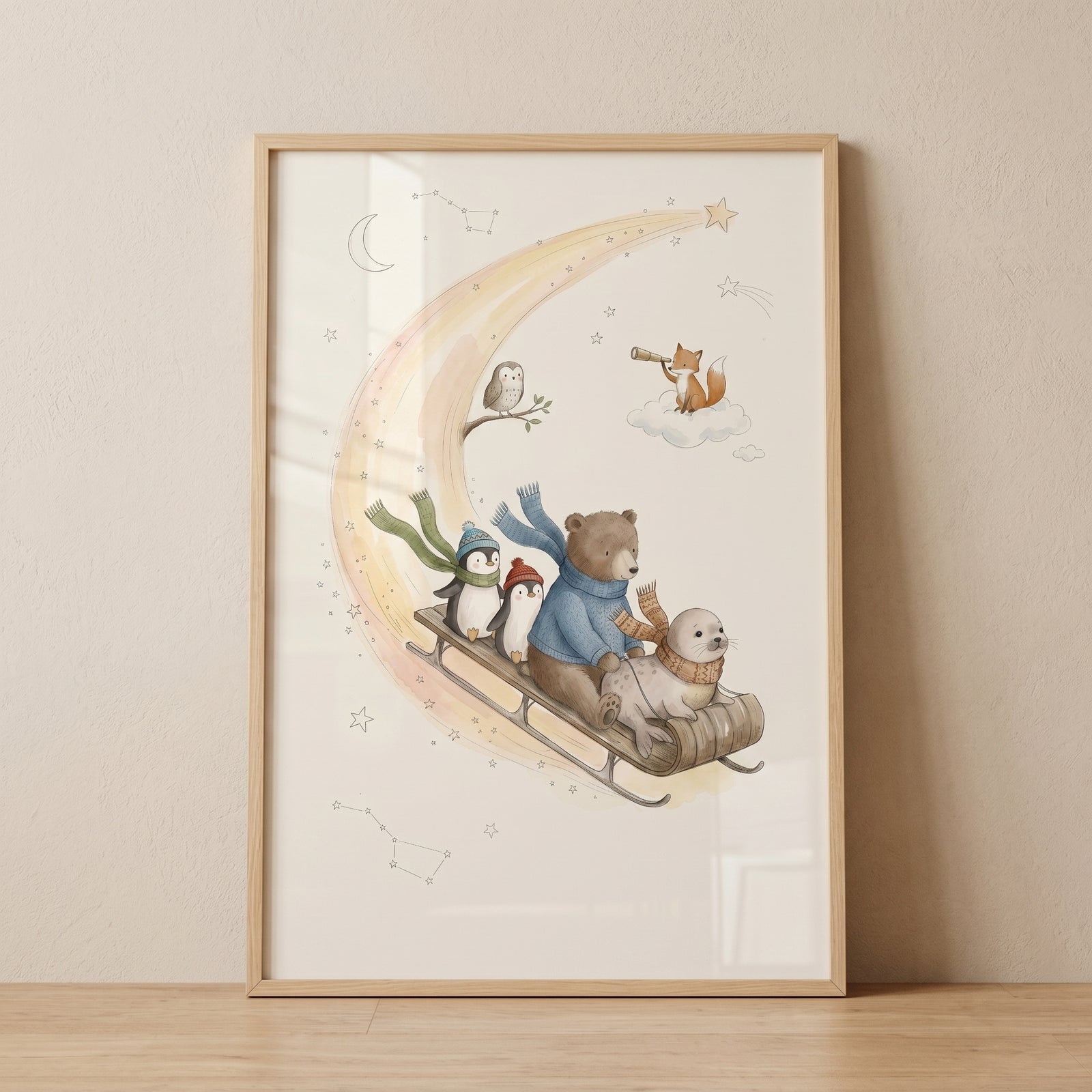 Watercolor winter sledding animals wall art featuring a bear, penguins, and seal sliding down a crescent moon.