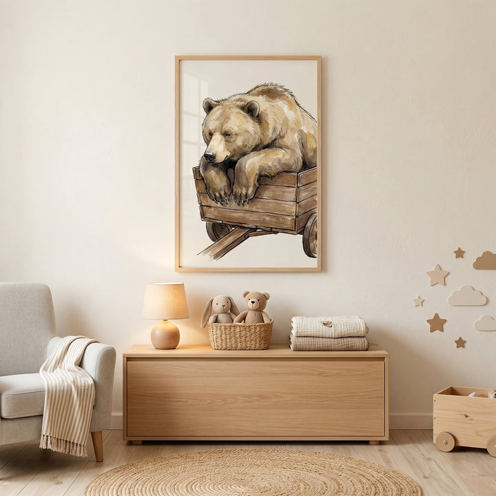 Nursery with watercolor wooden cart bear wall art above a wooden chest with toys, a lamp, and an armchair by a jute rug.