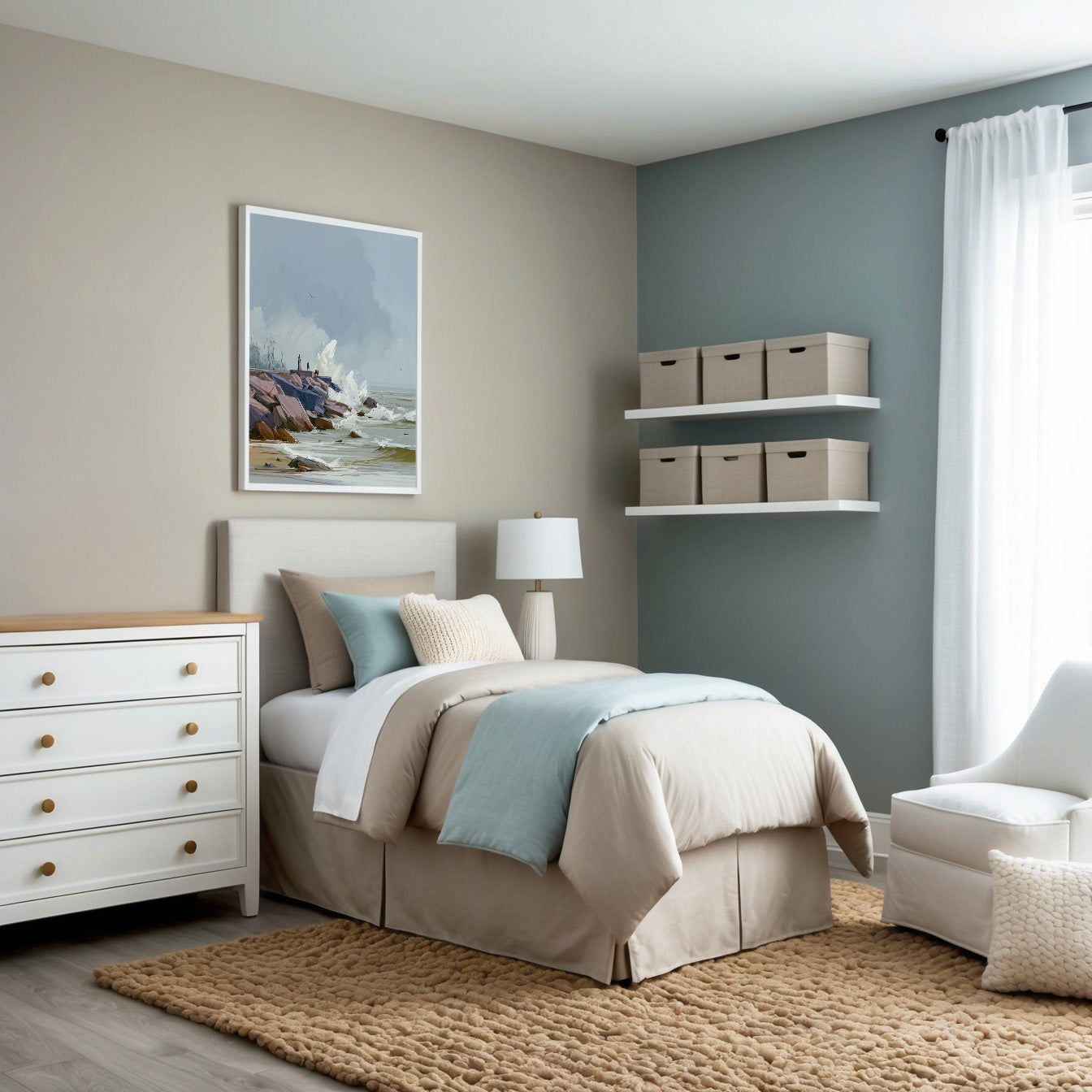 Modern bedroom decorated in neutral beige, white, and soft blue tones, featuring a neatly made bed, white dresser, floating shelves with storage boxes, and a framed coastal painting above the headboard.