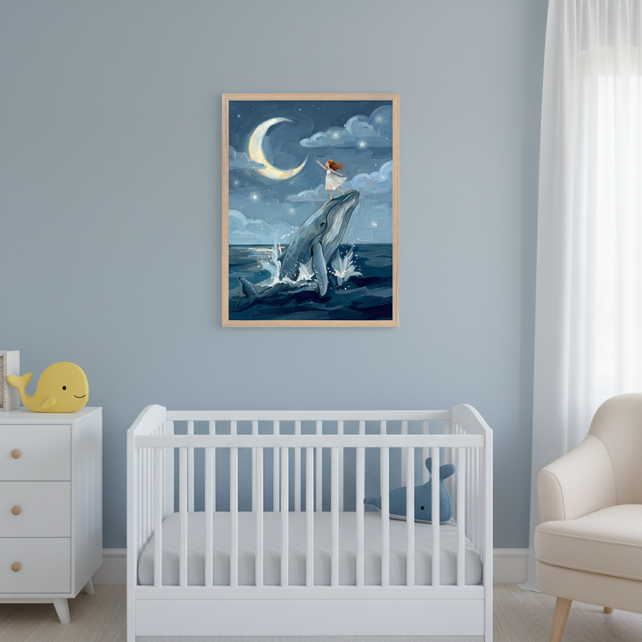 Modern nursery with light blue walls, a white crib, a matching dresser, and a beige armchair. A framed painting of a girl on a breaching whale under a crescent moon and stars hangs above the crib.