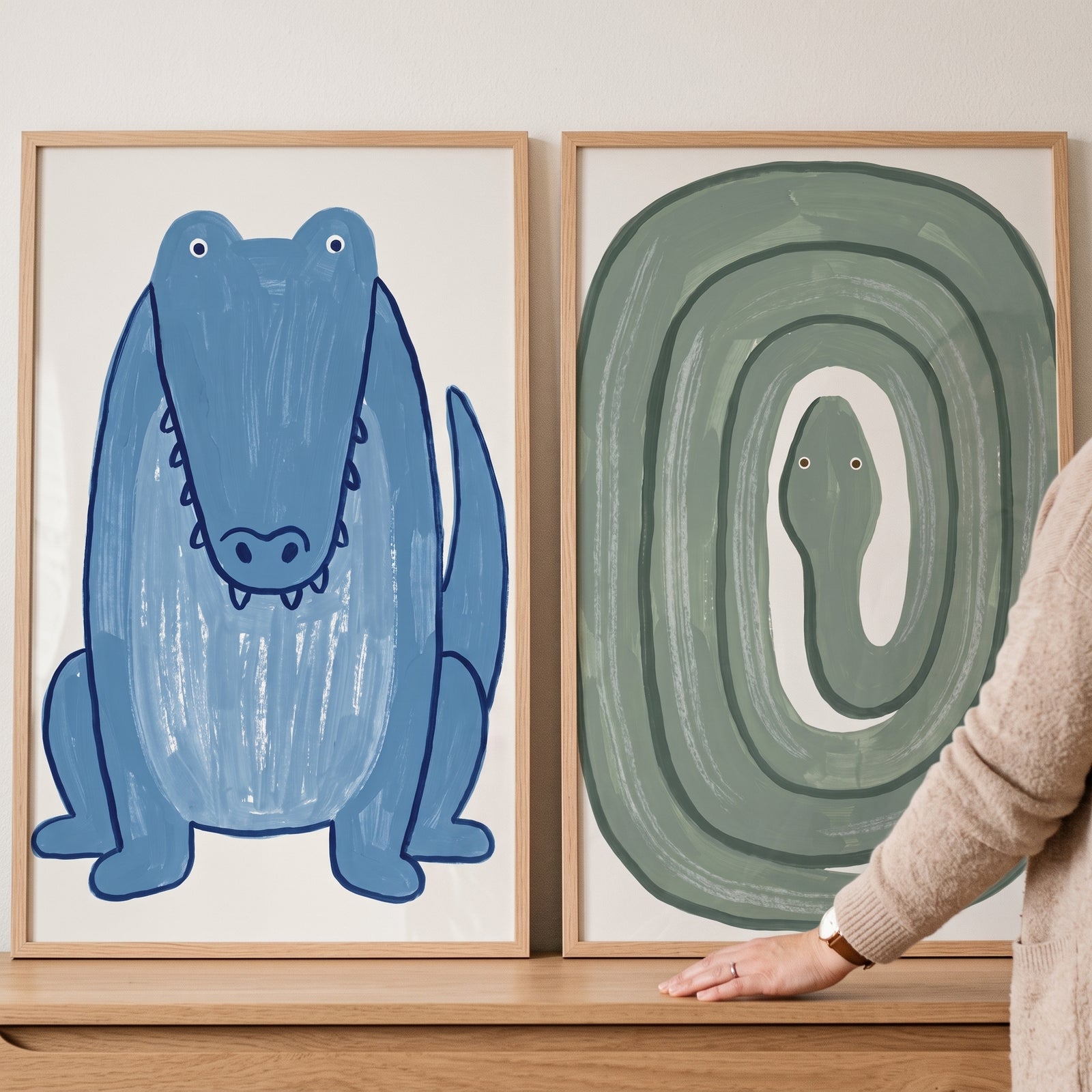 Whimsical blue green reptile animals print set of 2 featuring a stylized blue crocodile and a coiled green snake.