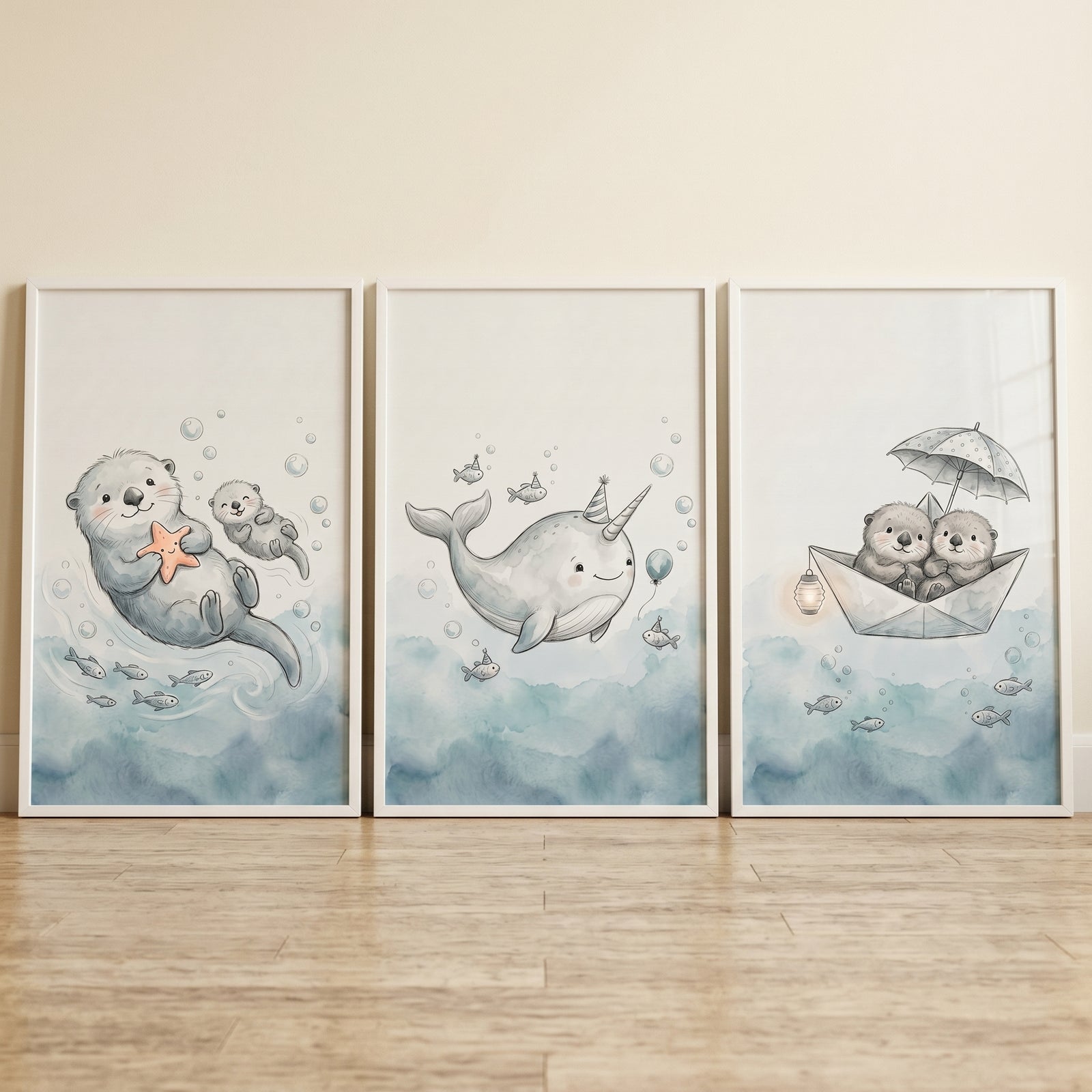 Whimsical blue sea animal wall art set of 3 featuring otters and a narwhal in a soft watercolor style.