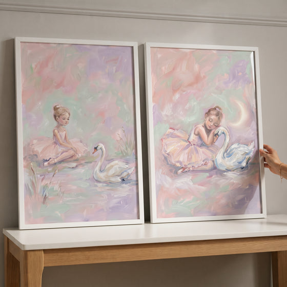 Whimsical blush swan ballet wall art set of 2 depicts a ballerina with a swan in soft, pastel tones.