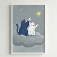 A textured digital illustration depicts two whimsical cats sitting on a fluffy grey cloud in a night sky. A dark-blue feline on the left peers through a small white telescope at a bright yellow star. To its right, a cheerful white cat smiles and points its paw toward the same star. The background is a muted grey with faint, hand-drawn star outlines. This artwork is displayed in a simple white frame against a clean white wall.