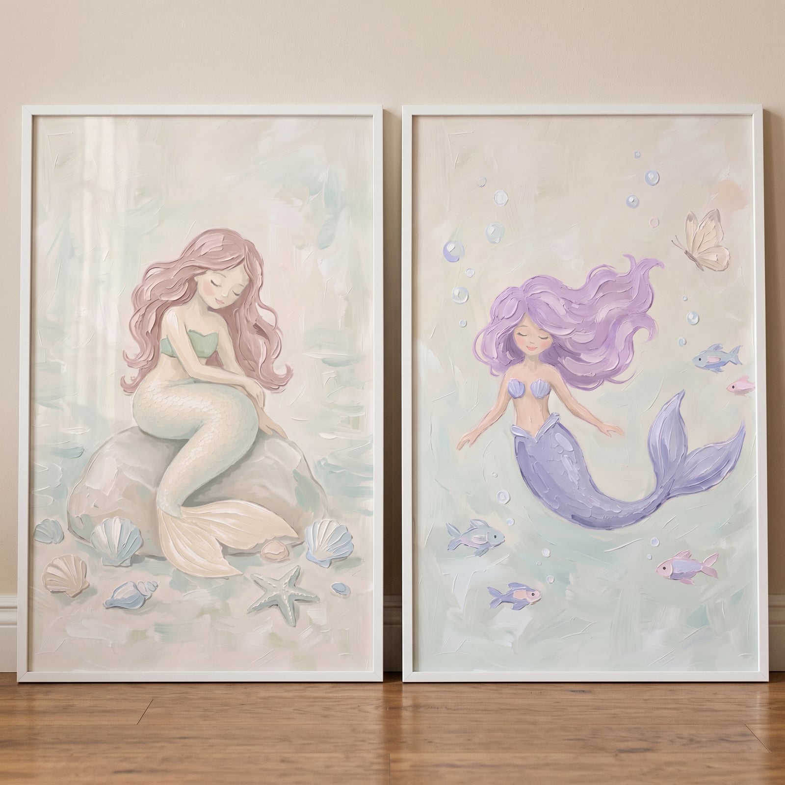 Whimsical ethereal ocean mermaid wall art set of 2. Framed pieces with pink and purple haired mermaids in pastel colors.