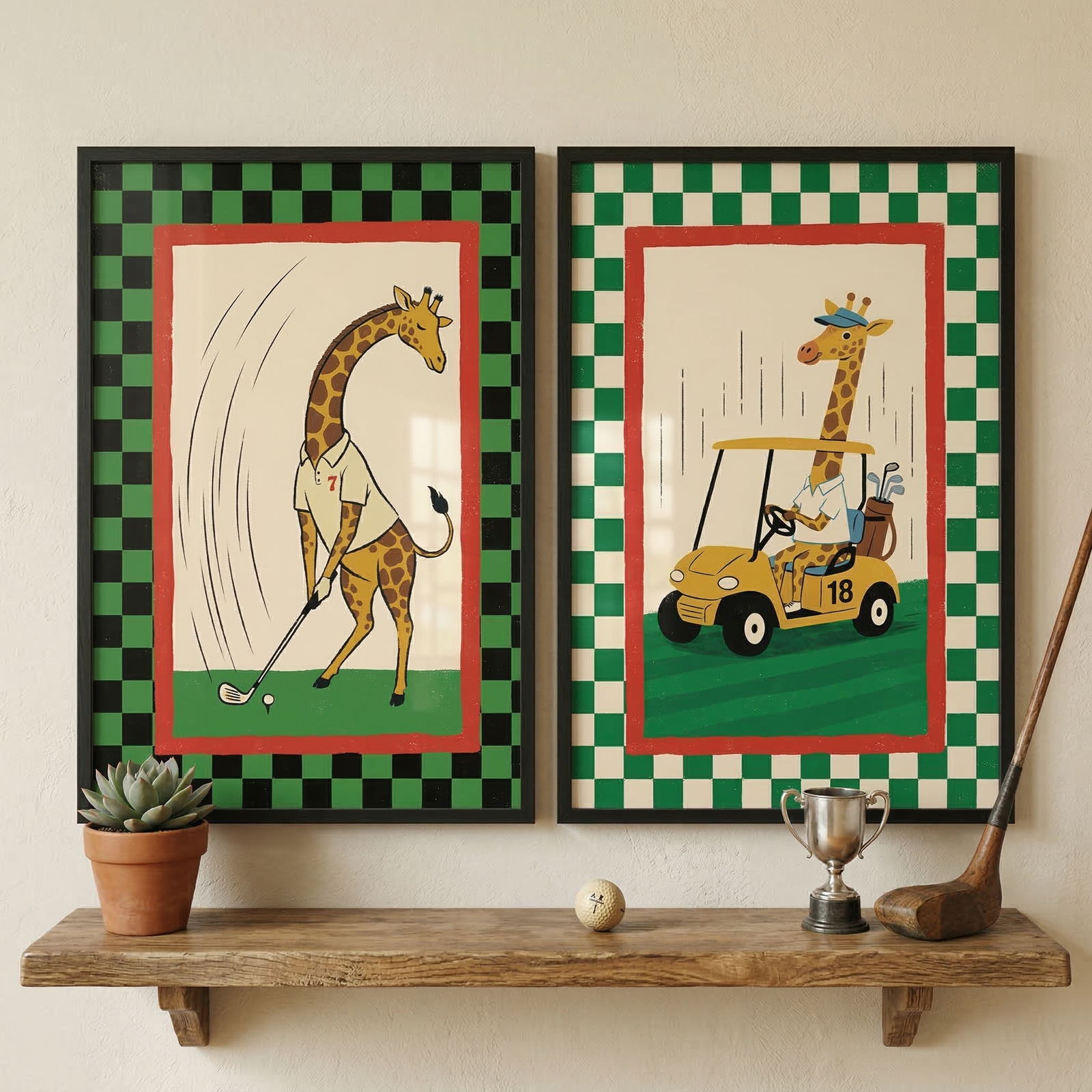 Two framed illustrations hang side-by-side on a light-colored wall above a rustic wooden shelf. Both pieces feature a whimsical giraffe in a golfing theme, set within a red frame and a checkered border. The left illustration shows a giraffe in a white polo shirt swinging a golf club at a ball, with a green and black checkered border. The right illustration shows a giraffe in a blue cap driving a yellow golf cart, with a green and white checkered border. 