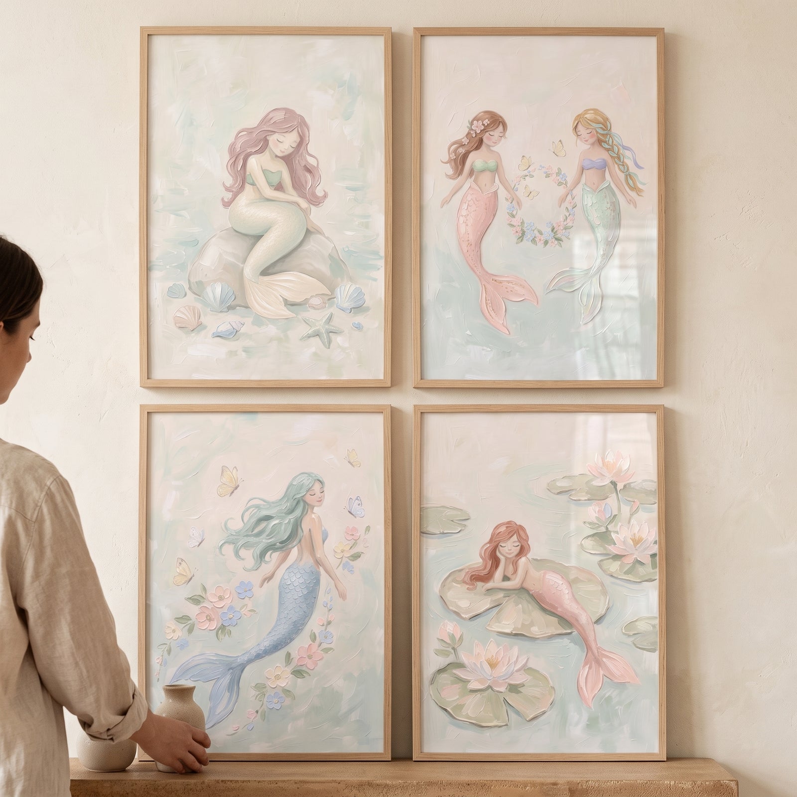 Whimsical fairytale ocean mermaid wall art set of 4 in wooden frames, showcasing mermaids in soft pastel colors.