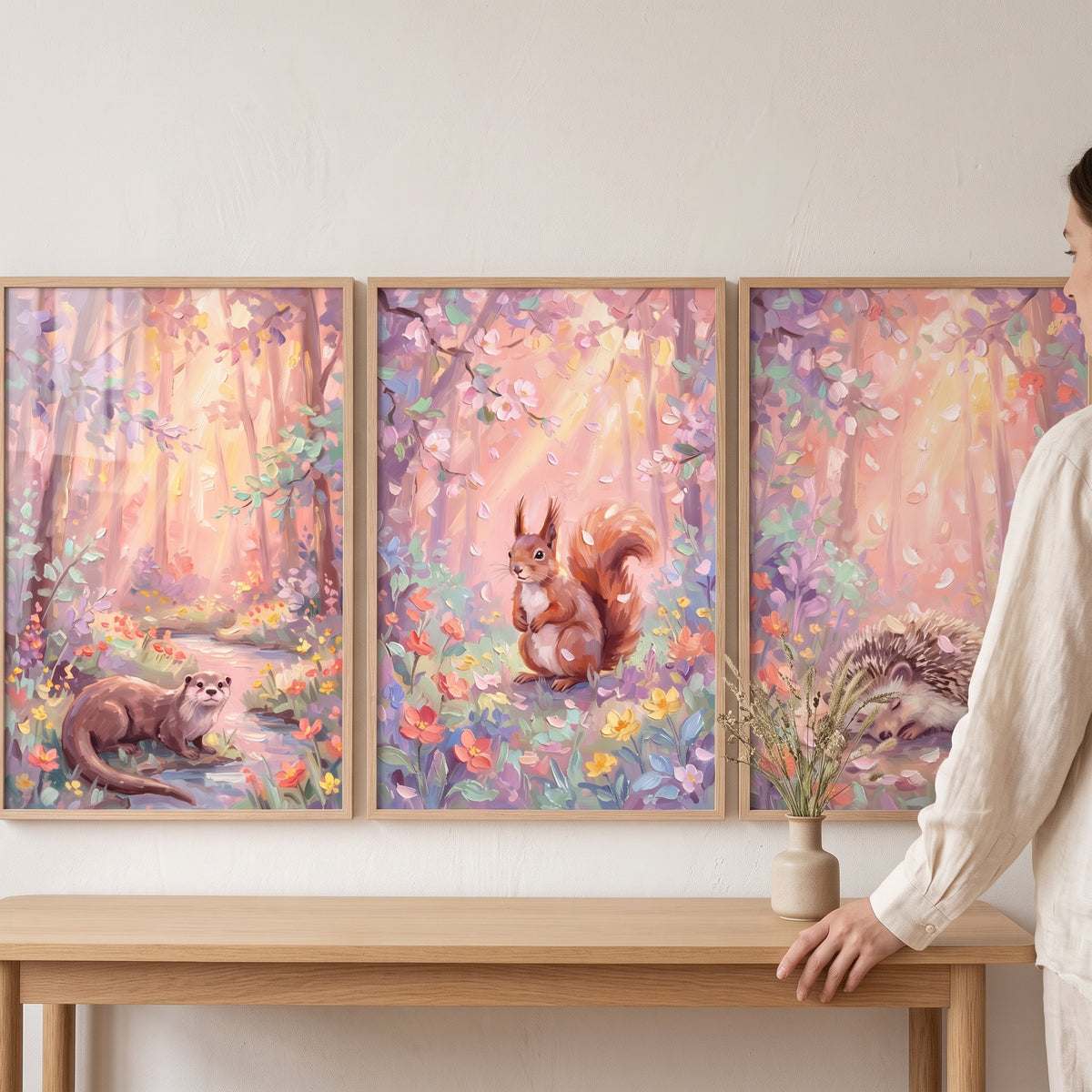 Whimsical sunlit woodland animals wall art set of 3 featuring an otter, squirrel, and hedgehog in colorful forest scenes.