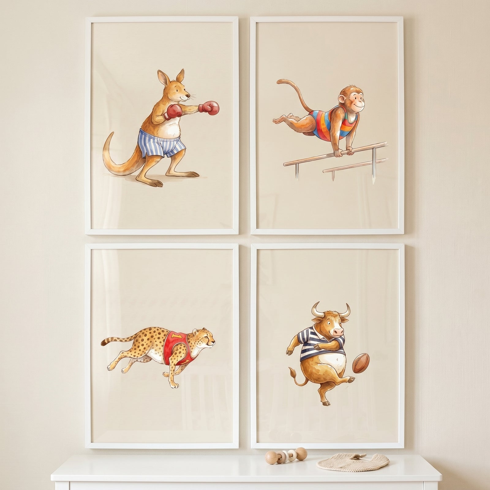 Whimsical watercolor athletic animals wall art set of 4 depicting a boxing kangaroo, gymnast monkey, cheetah, and bull.