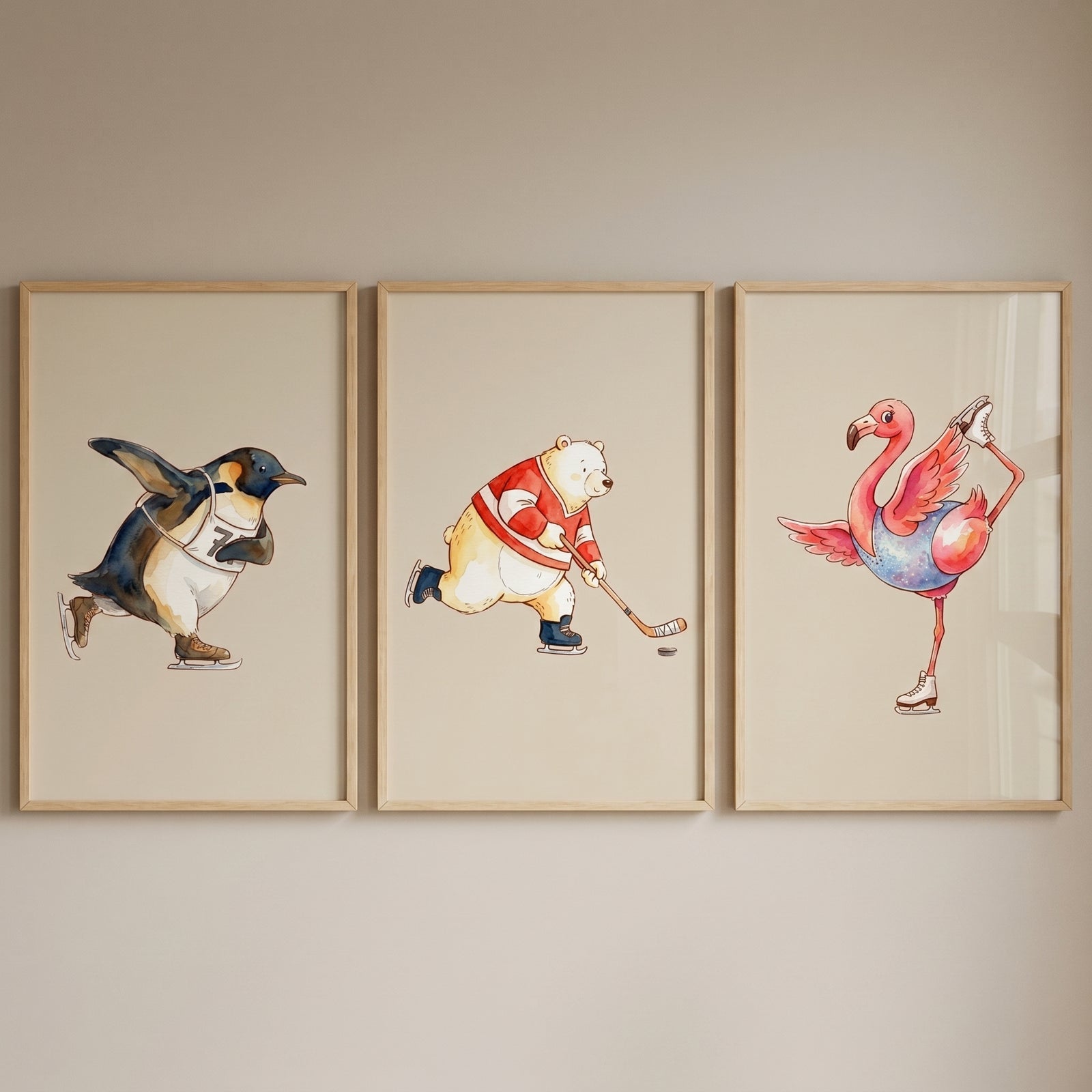 Whimsical watercolor skating animals wall art set of 3 featuring a penguin, polar bear, and flamingo on ice skates.