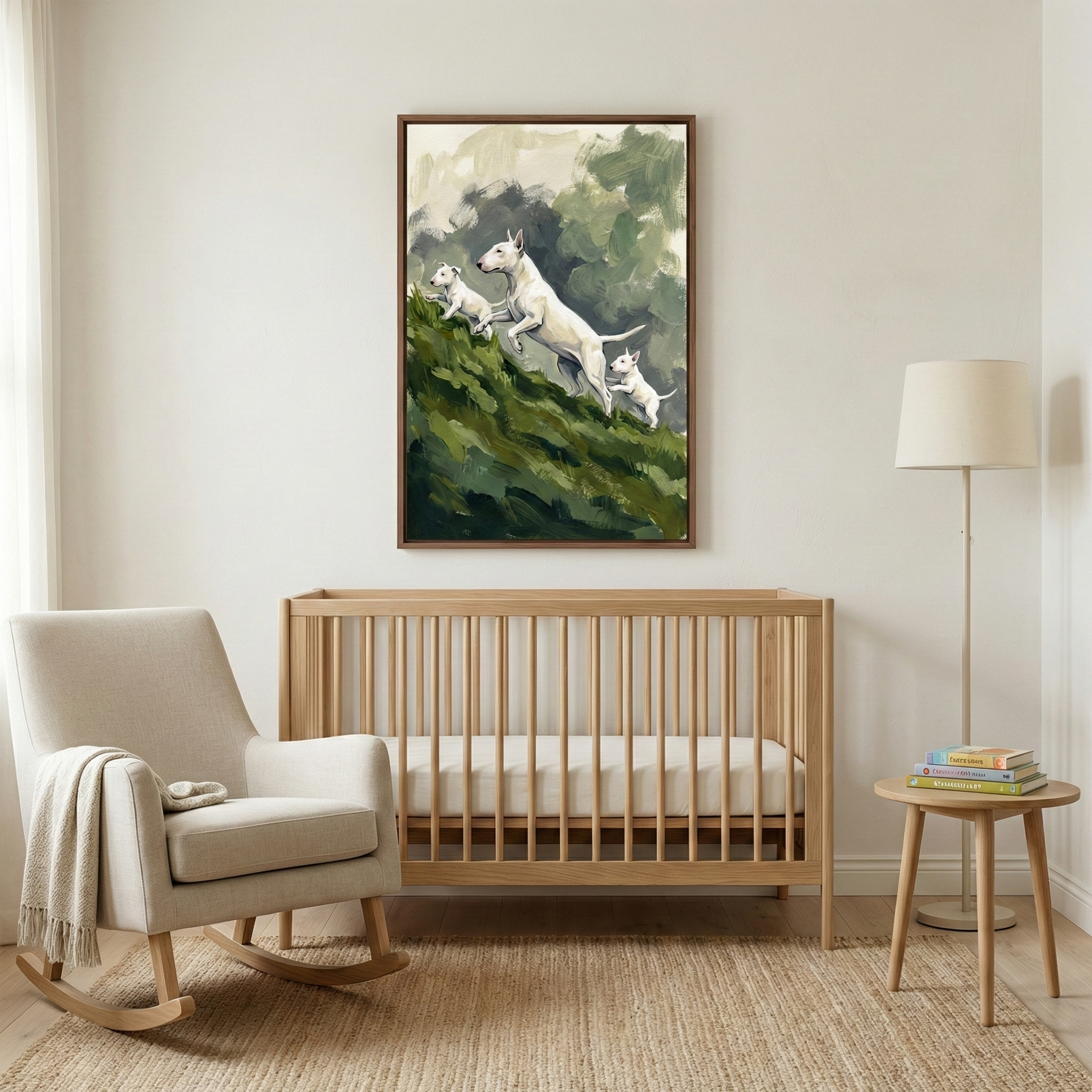 A serene nursery room with a warm, minimalist design features a light-colored wooden crib as the centerpiece. Above the crib hangs a framed piece of art depicting a trio of white, short-haired dogs—one adult and two smaller pups—joyfully ascending a vibrant green, textured hill against a muted sky. The style of the wall decor is expressive, characterized by bold, thick strokes that create a sense of movement.