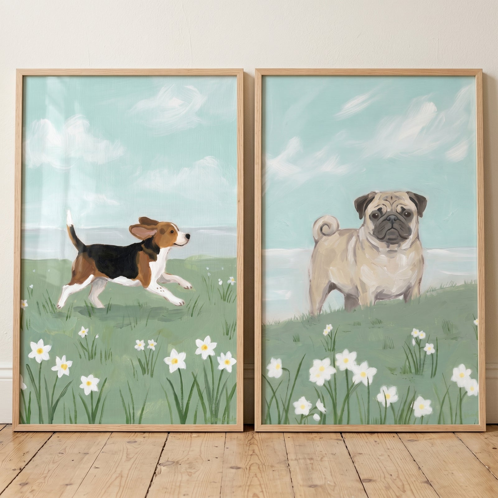 White daffodil coastal dog wall art set of 2 featuring a running beagle and a standing pug in a field of flowers.