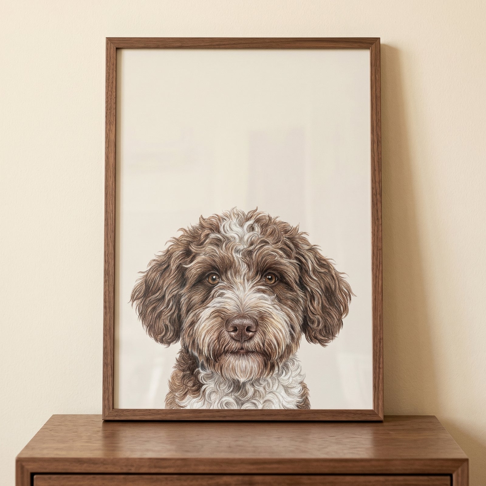 Framed white patch brown dog wall art on a wooden dresser. A detailed brown and white curly-haired dog illustration.