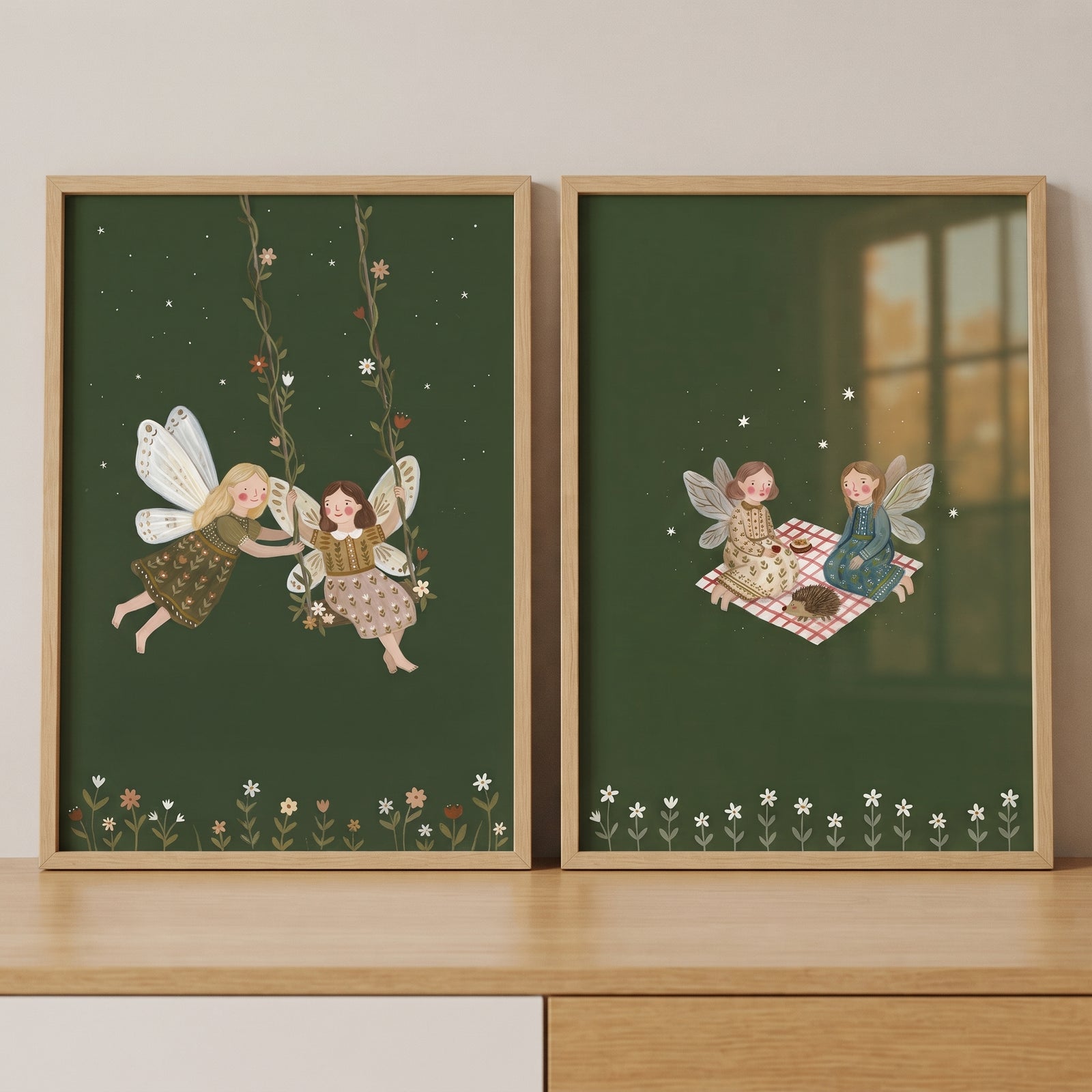Wildflower border woodland fairies wall art set of 2 with fairies on a swing and having a picnic with a hedgehog.