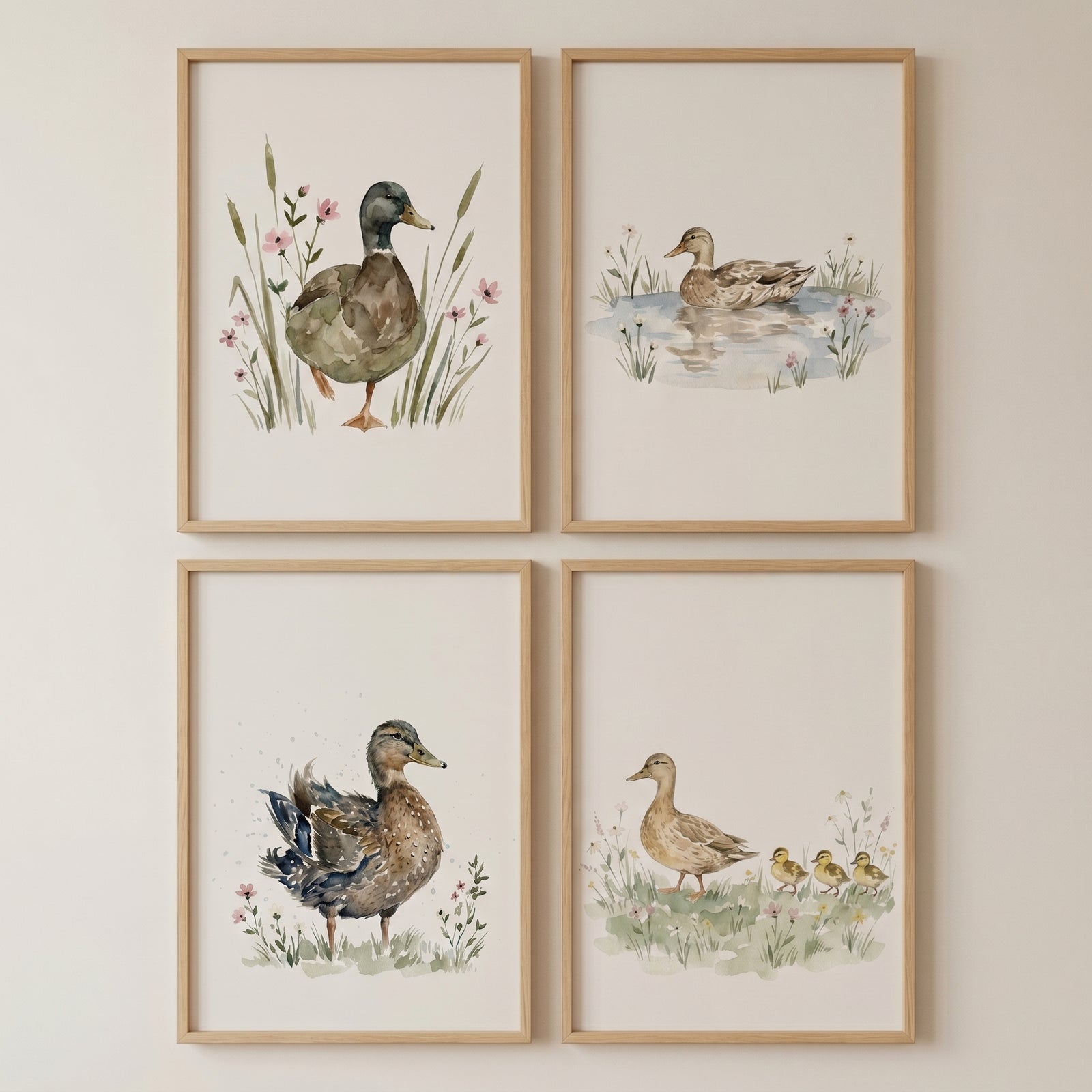 Wildflower mallard duck wall art set of 4 features watercolor illustrations of ducks and ducklings in grassy meadows.