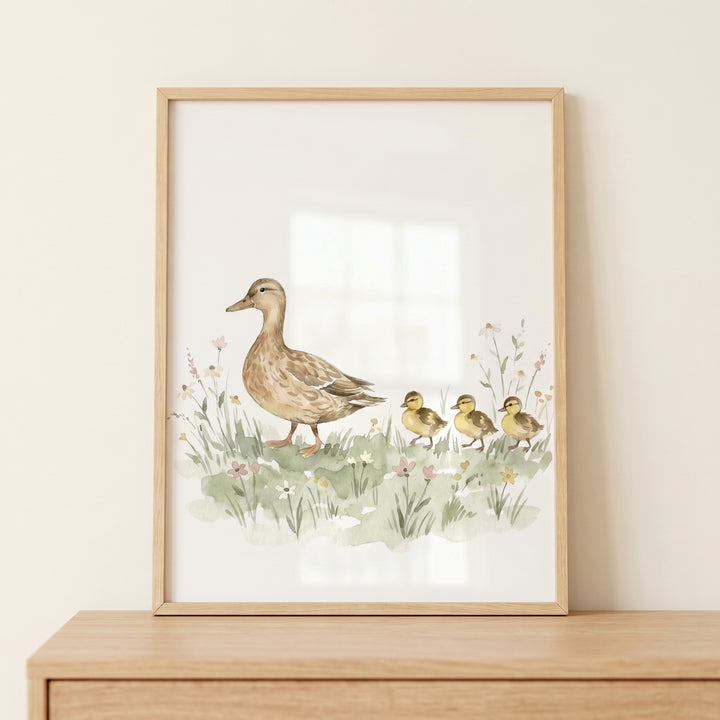 Framed mother duck and ducklings in a wildflower meadow nature duck wall art illustration on a wooden surface.