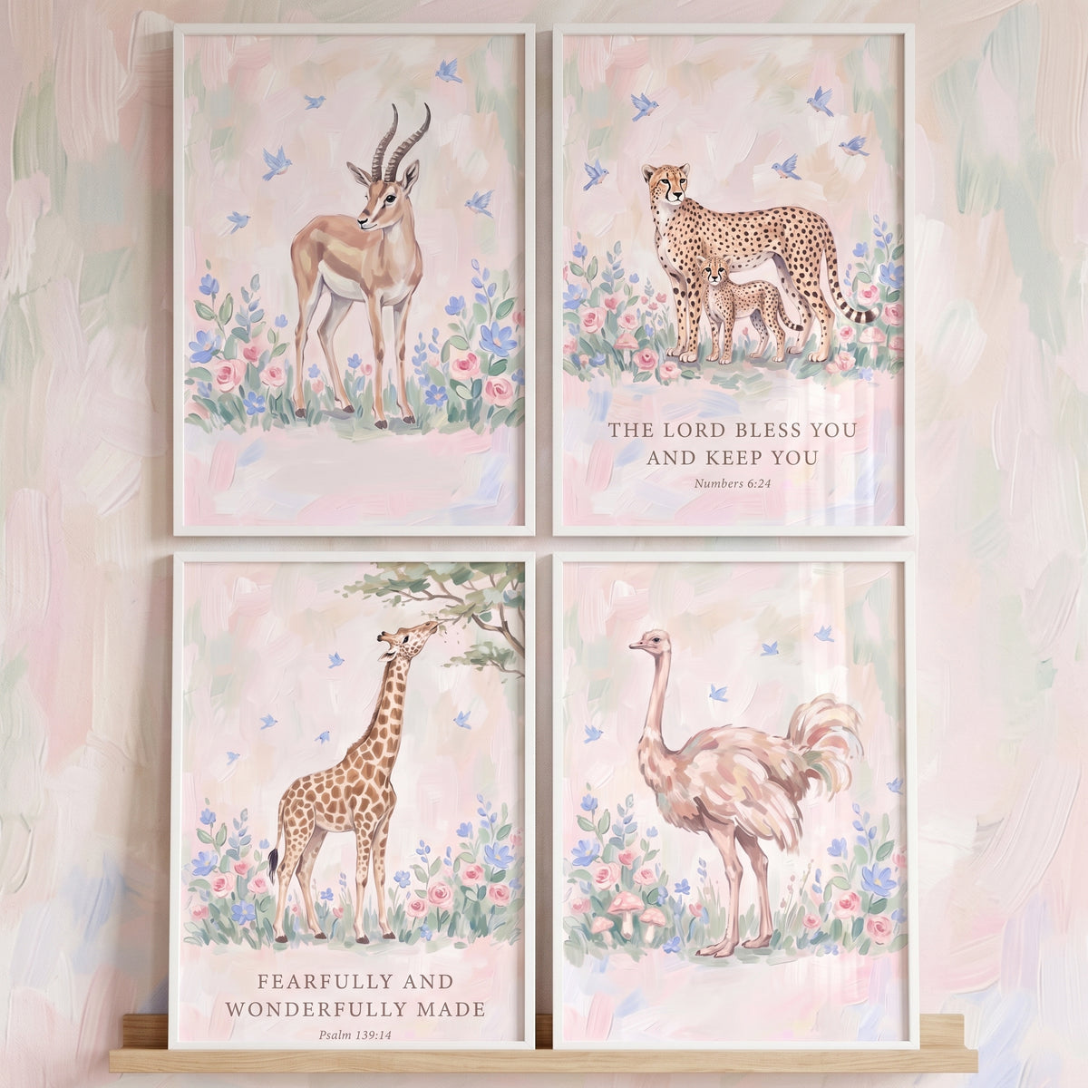 Wildflower songbird safari animals wall art set of 4 features a gazelle, cheetah with cub, giraffe, and ostrich in pastel.