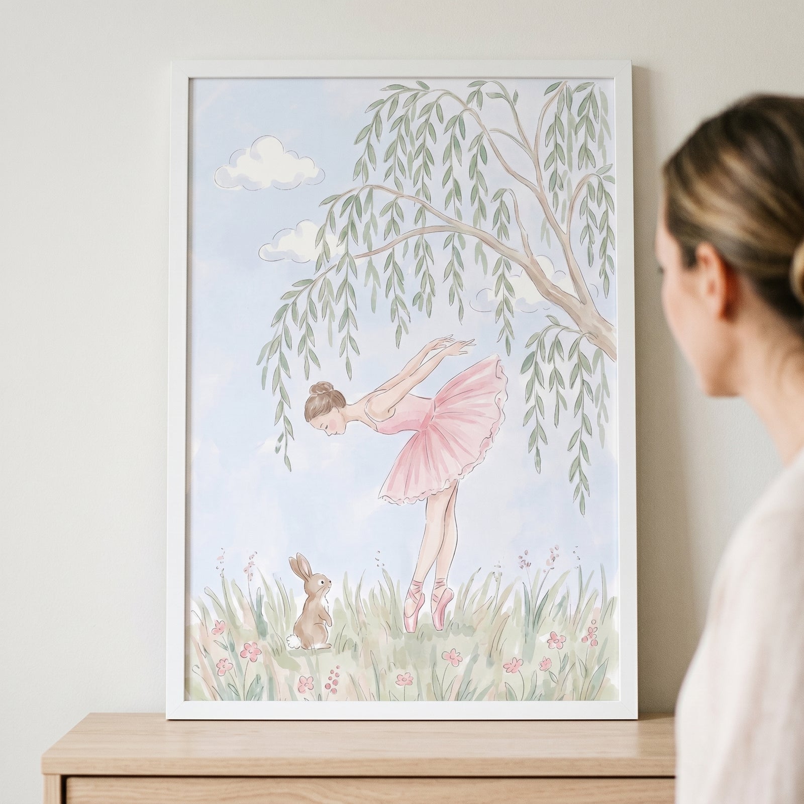 Willow tree pink ballerina wall art features a dancer bowing to a rabbit in a meadow under a weeping willow.