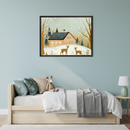 Kid's bedroom with a light wooden bed, white bedding, gray throw, and a side table with a mint green lamp. A framed illustration of a snowy winter scene with a house, solar panels, trees, and two deer hangs centered above the bed.