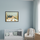 Modern nursery with a light blue wall. A framed illustration of a snowy winter scene featuring a house with solar panels, trees, and two deer hangs above a white crib with pillows and a beige armchair with a blanket. Light blue curtains are on the right.