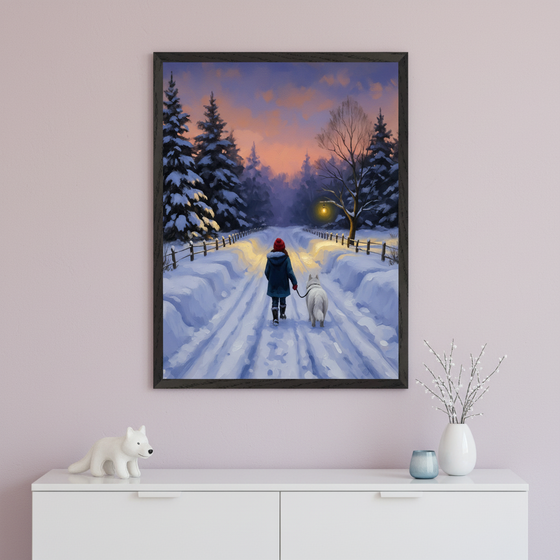 Framed artwork of a person in a red hat walking a white dog down a snowy path at sunset, surrounded by snow-covered pine trees, displayed above a white dresser with minimalist decor.