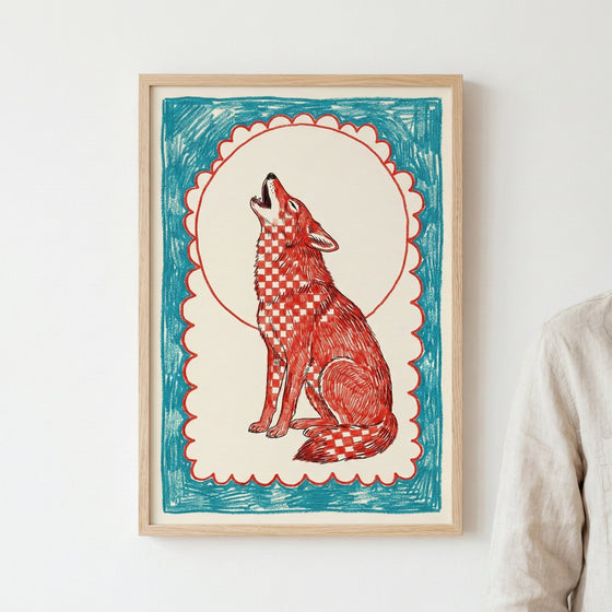 Whimsical red wolf illustration with a checkerboard pattern howling at a circle, set against a scalloped cream background with blue crayon-like border in a wooden frame.