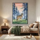 A large framed piece of artwork hangs on a bedroom wall, featuring a watercolor-style illustration of a wolf standing in a forest of blue pine trees under a soft orange sky. Below the wall art, a light wood bed is dressed in tan linens with a dark green textured blanket at the foot. A matching wooden nightstand with a simple lamp sits to the left. On the cream rug are various small wooden toys, creating a peaceful and natural-themed room.