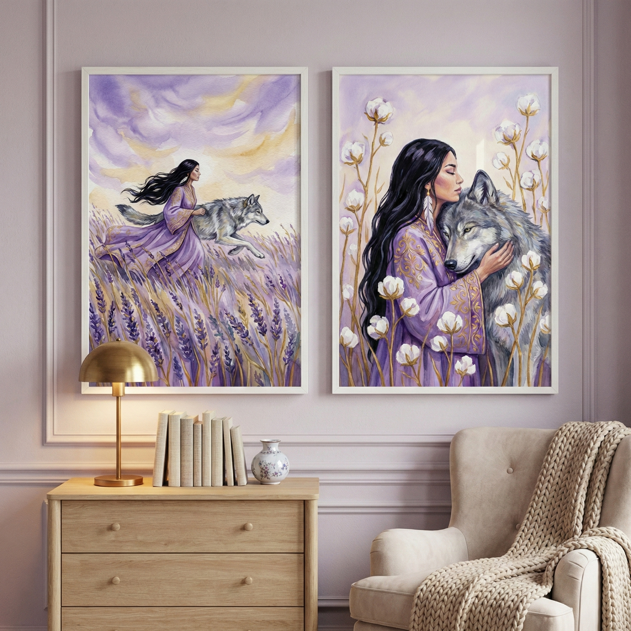 Two framed art pieces are displayed on a lavender wall. The left illustration depicts a woman running with a gray wolf through a lavender field under a purple and gold sky. The right shows a close-up of her in a purple robe embracing the wolf among white fluffy flowers. Beneath the art is a light wood dresser holding a gold lamp and books. To the right, a plush beige armchair is covered with a thick knitted throw blanket.