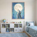 Star-themed children's bedroom features a framed painting of a blue-toned wolf howling at a glowing full moon, surrounded by shooting stars in a dreamy night sky. Below the artwork, a white cubby shelf holds colorful toys, books, and a globe, while the bed is dressed in soft blue bedding covered in white stars, tying into the celestial theme.