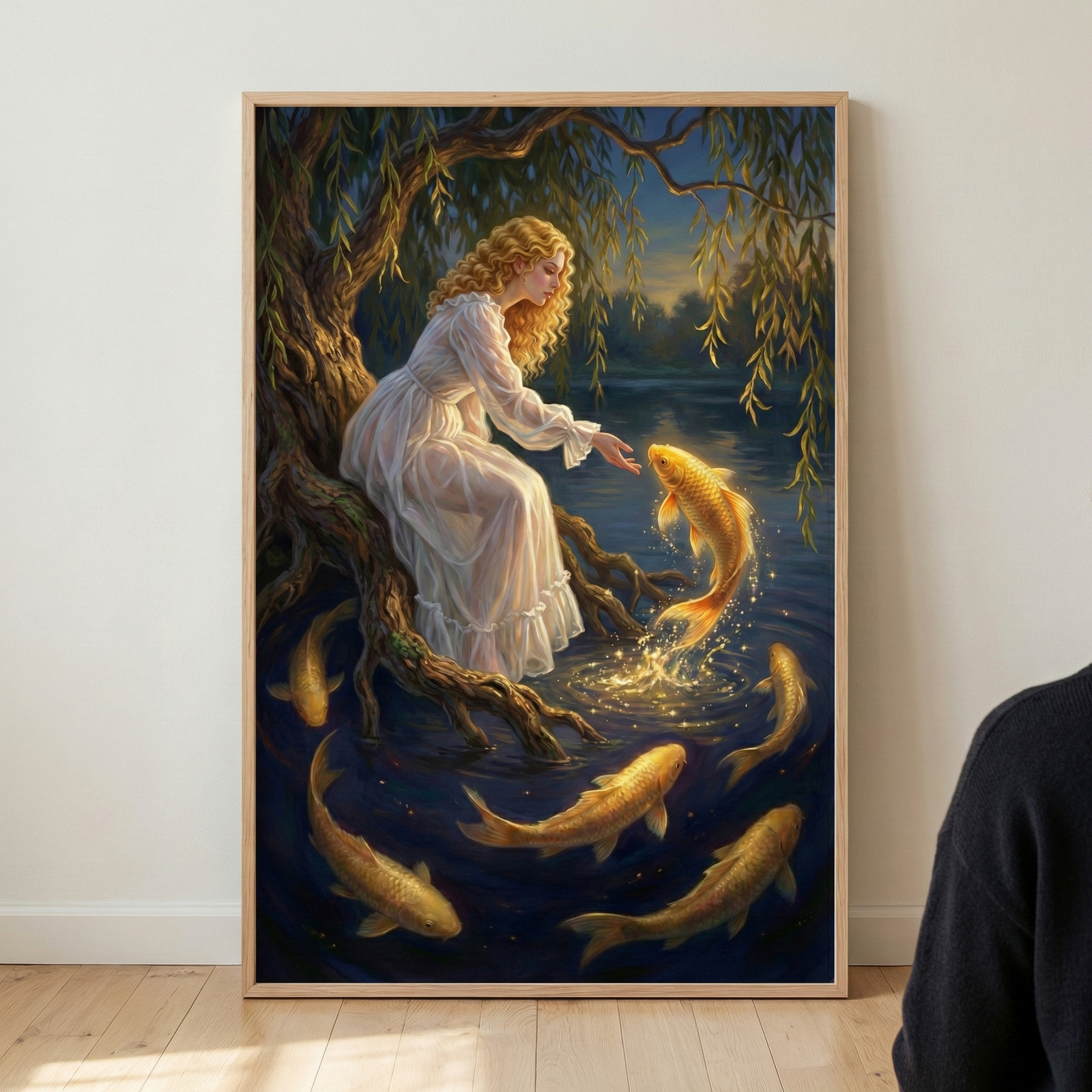 A framed vertical illustration shows a woman with long, curly golden hair and a flowing white dress sitting on gnarled tree roots by a dark lake. She reaches her hand toward a glowing golden fish leaping from the water. Below her, several more golden fish swim in the dark depths. Shimmering golden particles rise from the water's surface. A weeping willow with long, thin leaves hangs over the scene, creating an ethereal and magical twilight atmosphere.