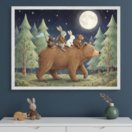 Modern kid's room with a dark blue wall. A large framed children's illustration of a bear carrying a mole, two rabbits, and a bear cub through a forest under a full moon hangs above a white dresser. On the dresser are a wooden bear, rabbit plush, and a green vase.