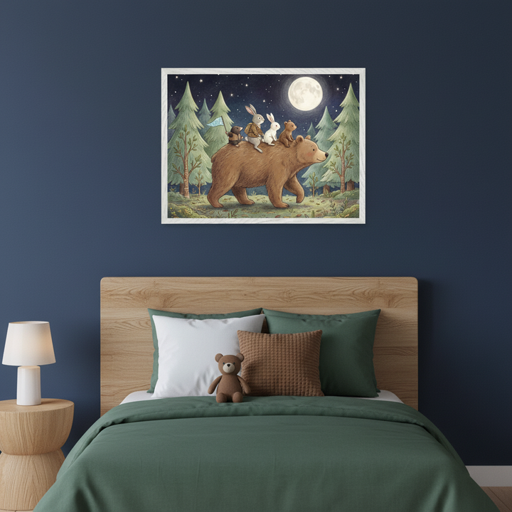 Kid's bedroom with a wooden headboard bed and dark green bedding. A large framed print of a brown bear carrying two rabbits and a small bear through a nighttime forest with a full moon hangs above the bed. A wooden nightstand with a lamp is next to the bed. A teddy bear sits on the bed.