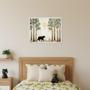 Kid's bedroom with a wooden bed, yellow tree-patterned duvet, and bedside table. A framed painting of a black bear walking in a forest with tall trees and a golden sun hangs centered above the bed.