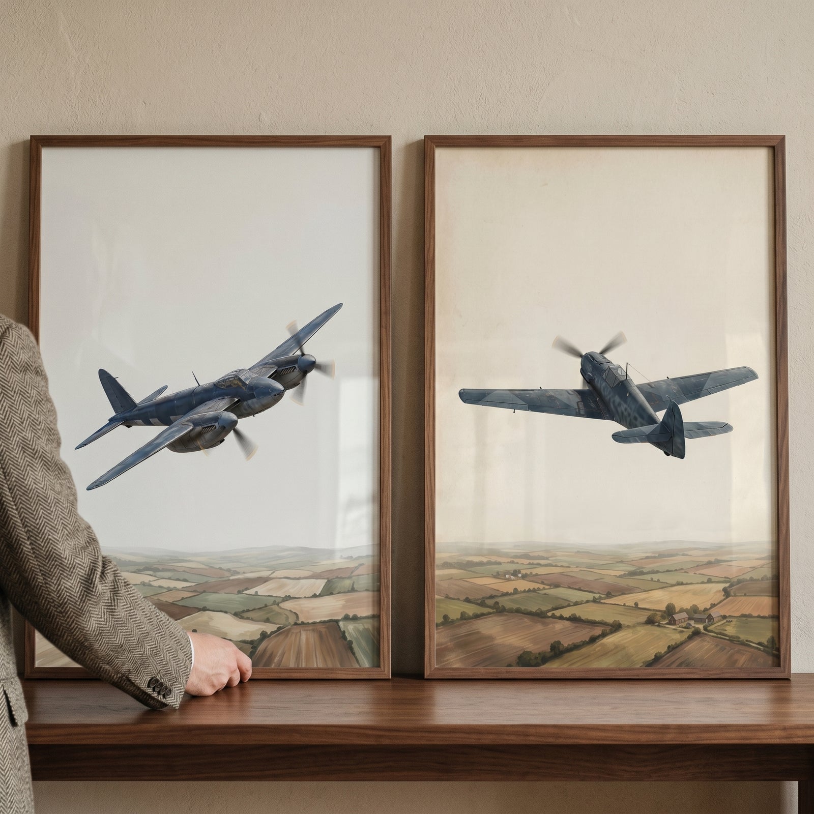Hand holding a wwii aerial combat airplane wall art set of 2 featuring vintage planes flying over a rural landscape.