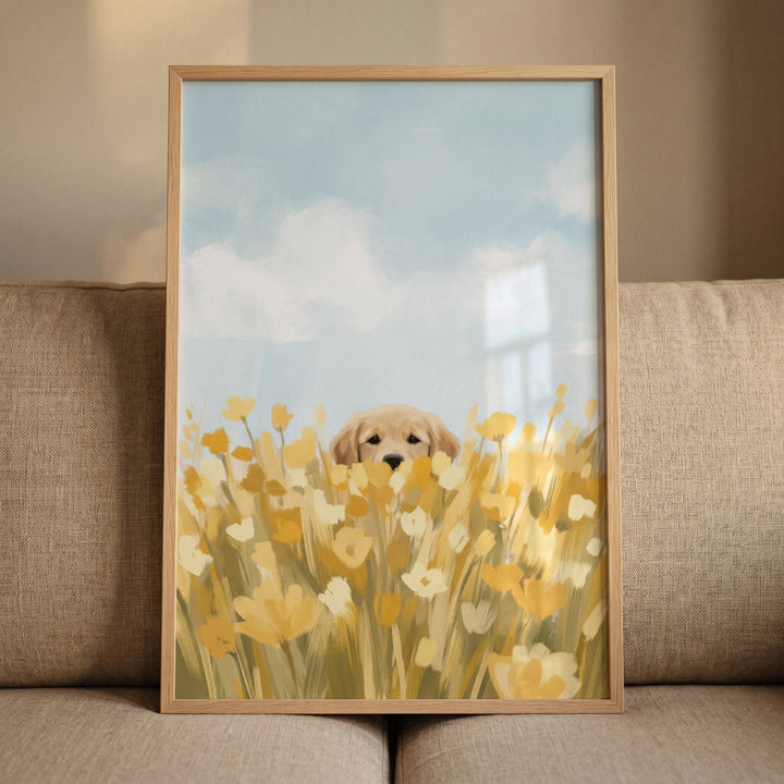 Yellow flower golden retriever wall art of a puppy peeking through blossoms, framed and resting on a neutral couch.